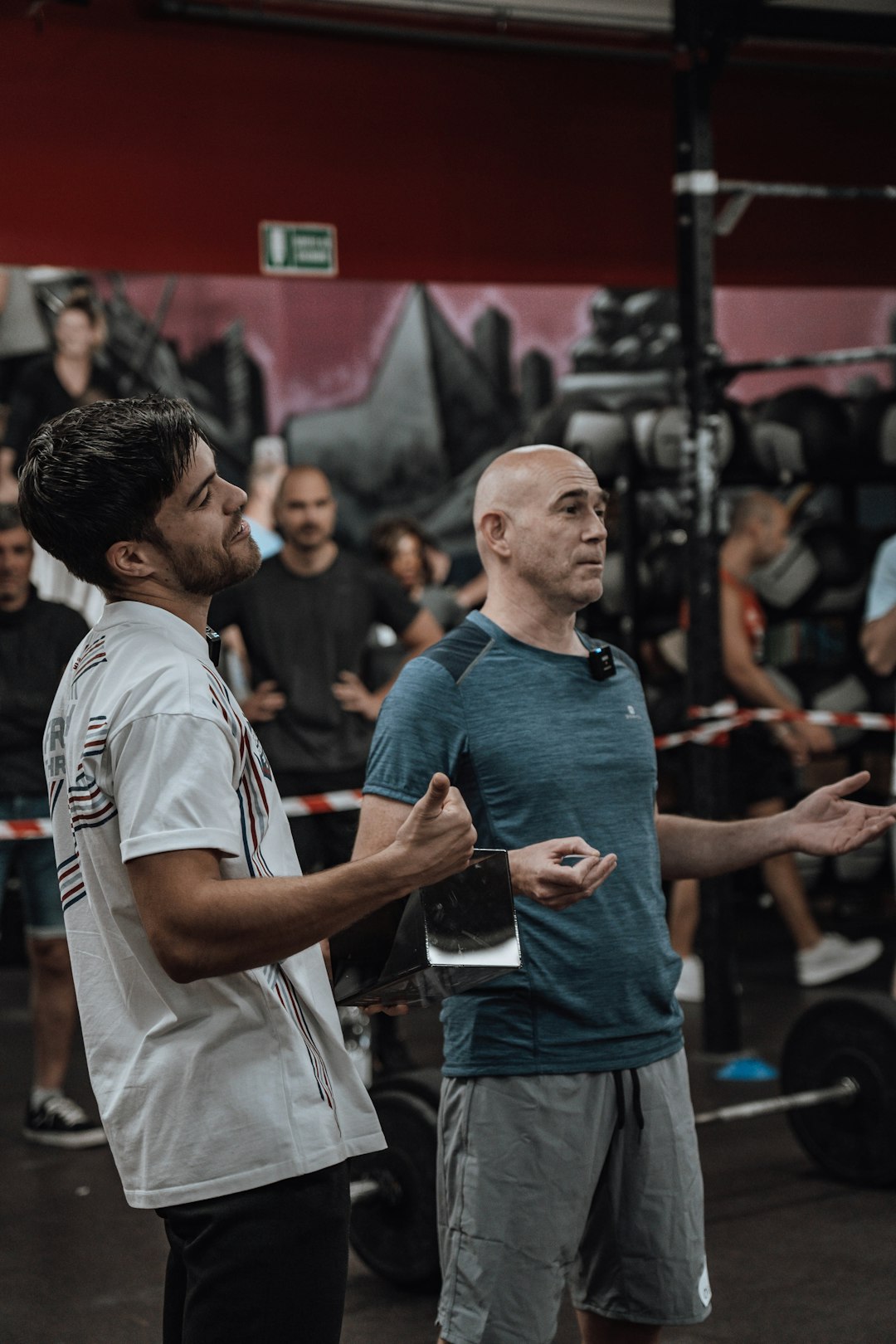 why-choose-us a-couple-of-men-standing-next-to-each-other-rd9ml-caw8m